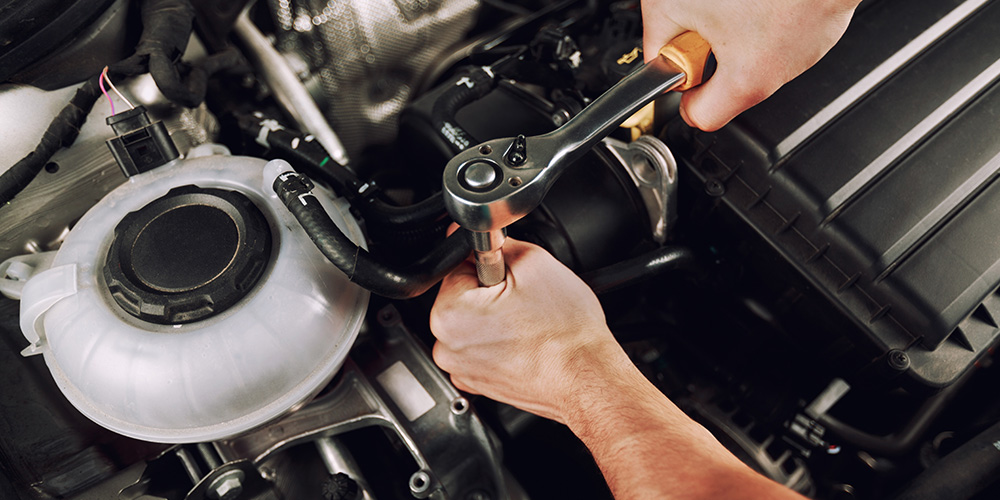 Image Of Mechanic Fixing The Car